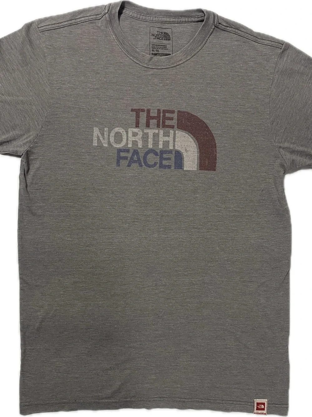 The North Face Men's Gray Logo Short-Sleeve Tee with Maroon and Blue Accents